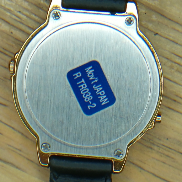 X Lorus Mickey Mouse Christmas musical watch gold tone case, black leather - Picture 9 of 9